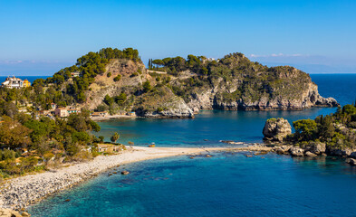 Panoramic view of Capo Taormina cape with Isola Bella island on Ionian sea shore in Messina region of Sicily in Italy