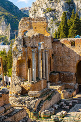 Greek and Roman period Teatro antico Ancient Theatre with stage and arches colonnade in Taormina at Ioanian sea shore of Sicily in Italy