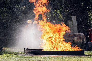 Fire flame in a firefighting training exercise. Firefighter training Concept.