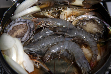 Food materials and ingredients for seafood stew in the pot