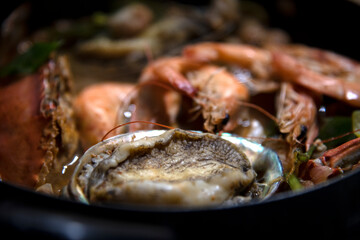 Seafood stew on the pot