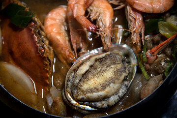 Seafood stew on the pot