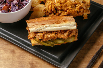 sandwiches and potatoes on the table in the bar