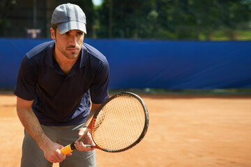 Athlete, man and racket in tennis court for training, fitness and sports for competition or hobby....
