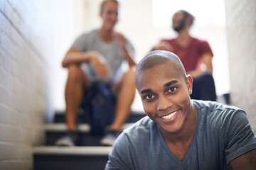 Portrait, stairs and student with smile, black man and together with classmates as friends for conversation. University, school and campus with course for person, scholarship and people relax