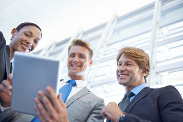 Business people, tablet and meeting for project in office, collaboration and unity for proposal. Coworkers, workplace and teamwork for reading a report, support and online for review and networking