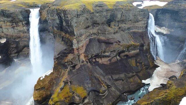 Haifoss and Granni waterfalls in volcanic canyon landscape Iceland