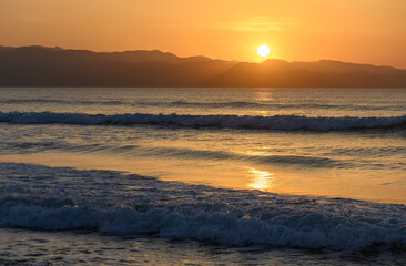 winter sunset on the Mediterranean sea against the backdrop of mountains 1