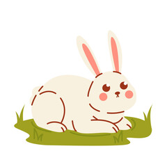 Easter bunny on lawn isolated on white background. Cute rabbit sits on grass. 