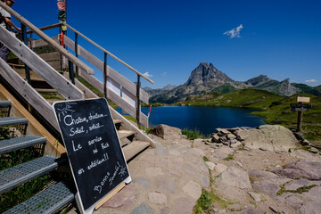 people on Ayous hut, Gentau lake, Ayous lakes tour, Pyrenees National Park, Pyrenees Atlantiques,...