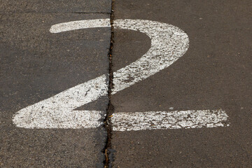 a street with the number two painted on it