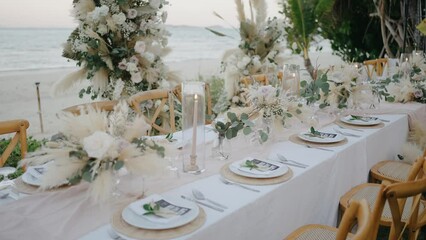Luxury decoration reception dinner set up Romantic decoration wedding setup Festive fine setting table row chair  reception party. birthday,Christmas, Valentine, honeymoon