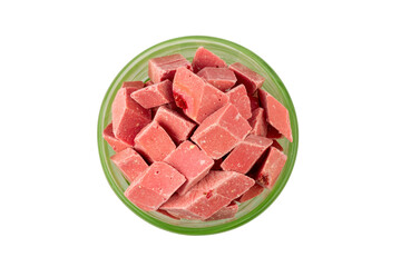 pink pieces of Uzbek dairy strawberry halva in a green bowl isolated on a white background top view - 747832864