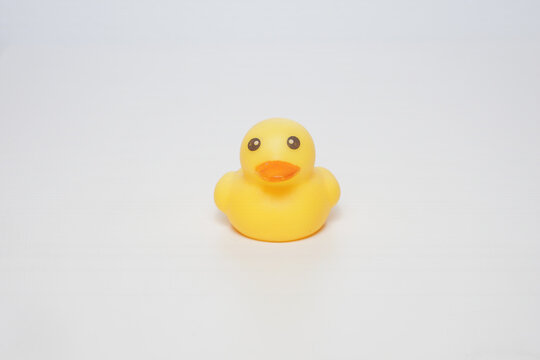 Yellow bath ducky from the front angle on a white background   