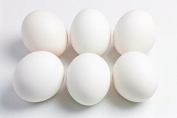 Fresh White Eggs on White Background. Perfect Food Ingredient for a Healthy Diet