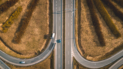 road infrastructure with a bridge and connecting two roads - a motorway and a motorway exit....