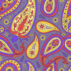 Seamless pattern with colorful Paisley motifs on purple background. Traditional indian repeat design.