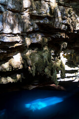 Mystical Sunlight Illuminating the Hidden Cave Waters