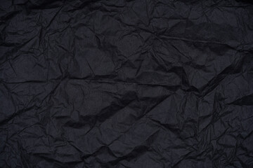 Textured Black Paper with Torn Edges.
