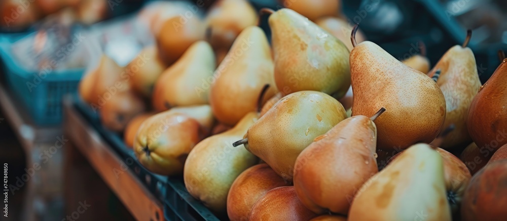 Poster a close-up shot of a variety of ripe pears neatly stacked on display in a market stall, ready for pu