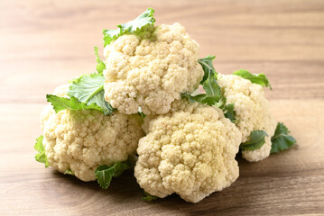 Organic cauliflower on wooden background, Healthy vegetables for food ingredient