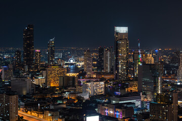 Fototapeta na wymiar Aerial view of Bangkok skyline and skyscraper Bangkok cityscape. Bangkok night view in the business district