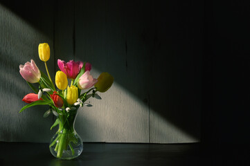 Vase of Tulips isolated on table - 747852034