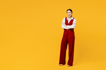 Full body confident young lawyer employee business woman of Asian ethnicity wear formal red vest...