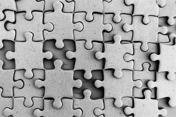 a page full of puzzle pieces scattered professional photography