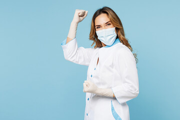 Female happy fun doctor woman wears white medical gown suit sterile mask gloves work in hospital...