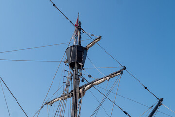 Fototapeta na wymiar Mainmast and rope ladders to hold the sails of sailboat.