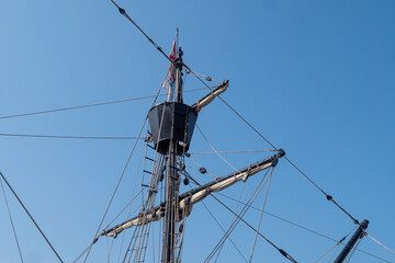 Fototapeta premium Mainmast and rope ladders to hold the sails of sailboat.