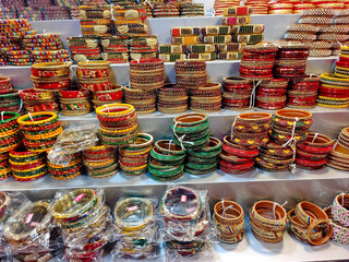 Indian colorful bangles displayed in local shop in a market of Ujjain, India, These bangles are made of Glass used as beauty accessories by Indian women.