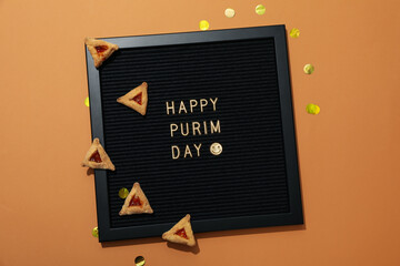 A mask with traditional cookies for the day of Purim.