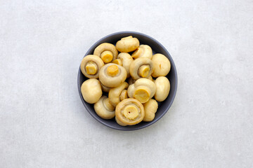 Champignon mushrooms in brine. Canned champignon mushrooms whole