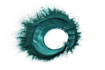 Spirulina powder spiraling elegantly on a white background