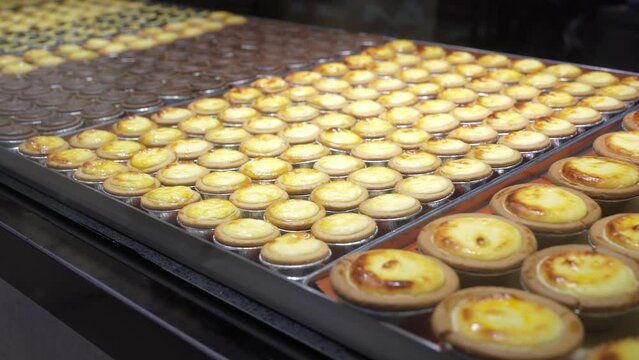 Close-up view of the various types of Hokkaido baked cheese tarts.