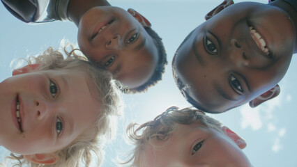 Circle of diverse children from a bottom-up perspective, unity and friendship in their smiles.