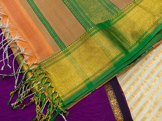 Hand Weaving Silk & Handloom Sarees, saree with golden details, woman wear on festival, ceremony and weddings, expensive sarees are famous for their gold and silver zari, brocade. Incredible India.