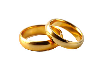 two golden wedding rings on a transparent background