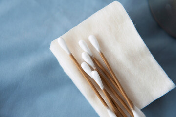 Closeup pure natural material cotton buds for daily routine removing makeup or facial cleaning with...