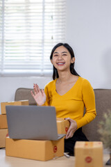 Startup small business entrepreneur SME freelance woman working with box, Young Asian small business owner office online market packing delivery, SME delivery e-commerce telemarketing seller concept