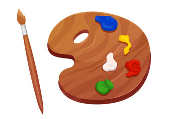 Wood pallette for paint with paintbrush, painters equipment for using and mixing colors isolated on white background.