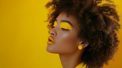 Model profile portrait of an African American woman in afro hairdo, creative yellow eyeshadow and lips on a colorful backdrop. - obrazy, fototapety, plakaty