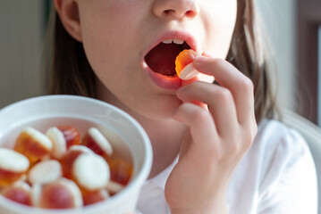 Child Girl Eating Gummy Candy
