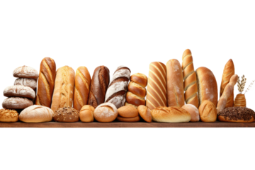 A long row of various breads and pastries is neatly arranged on a wooden table, showcasing a delicious assortment of baked goods.