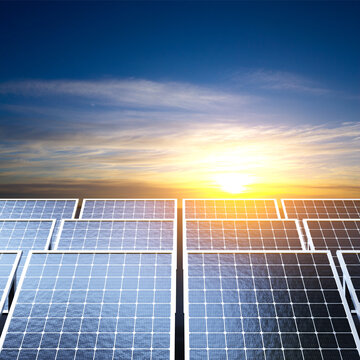 Photovoltaic modules for renewable energy against the sunset. 3d-rendering