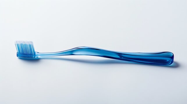 A blue plastic toothbrush captured in top view, sideways, and lengthwise orientations against a white background