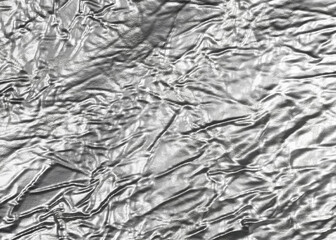Fototapeta premium Wrinkled sheet of crushed tin aluminum silver foil
