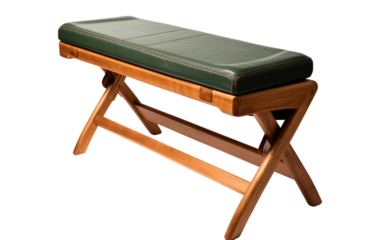 A simple wooden bench with a green leather seat is situated in a park. The bench appears sturdy and well-maintained, blending seamlessly with the natural surroundings.